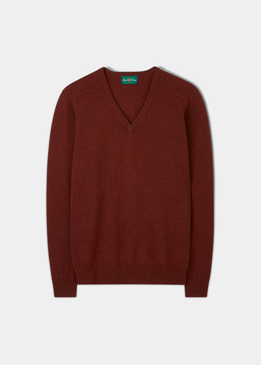 Hampshire Lambswool Vee Neck Jumper in Sienna, classic fit, saddle shoulder, laid flat on white background.