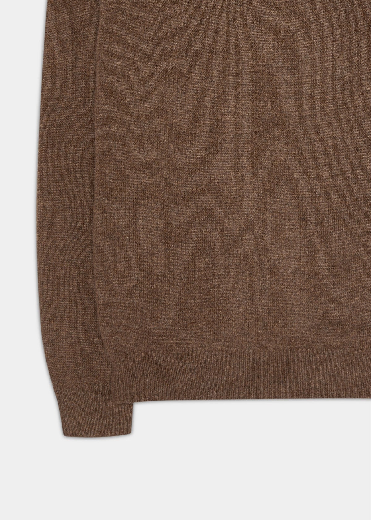 Close-up of the Kilsyth Lambswool V-Neck Jumper in Tobacco, highlighting its texture and left long sleeve.
