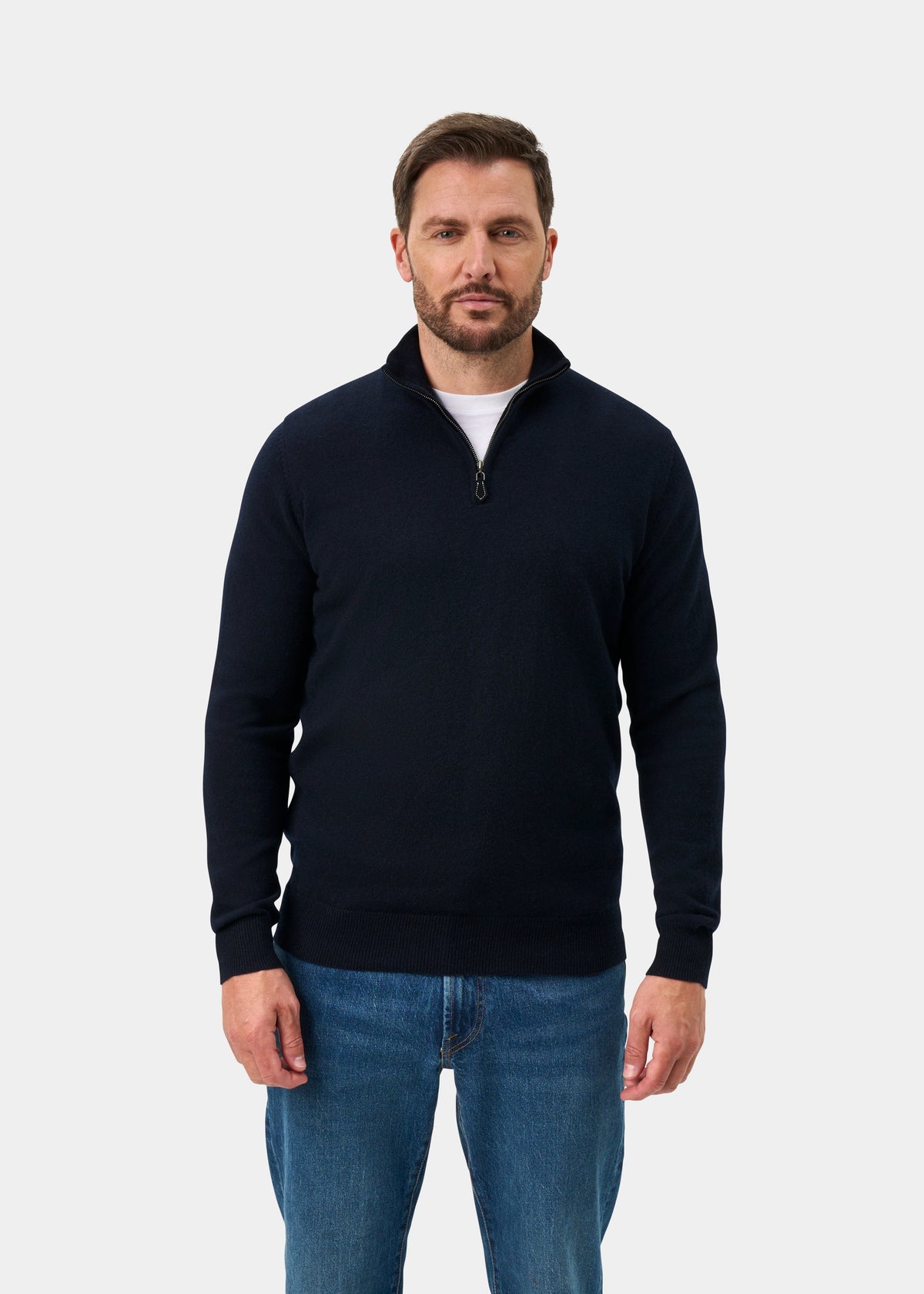 Man in Hanbury Pure Cashmere Quarter Zip Jumper (Dark Navy, Regular Fit) over white shirt and blue jeans.