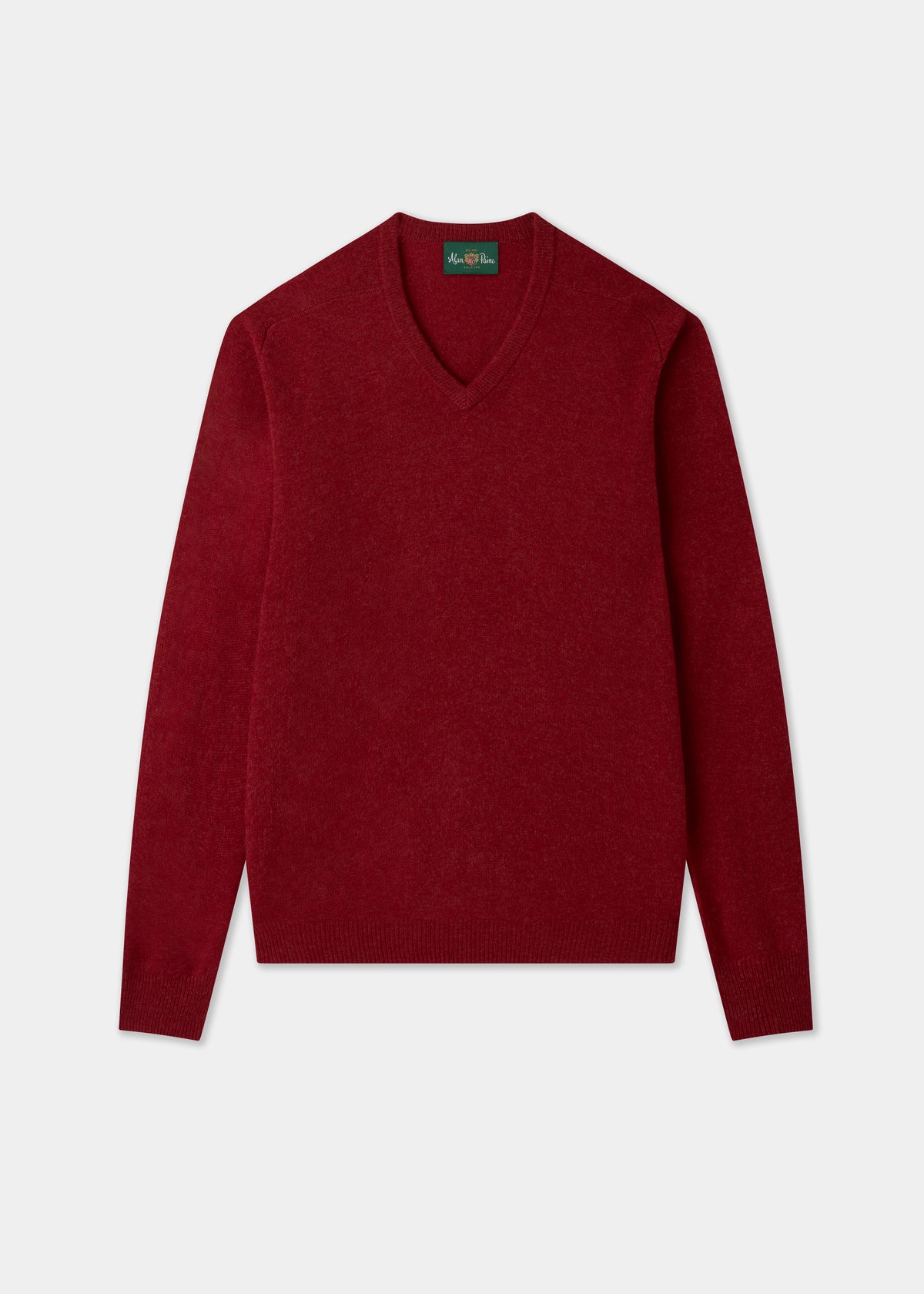 The Hampshire Lambswool Vee Neck Jumper in Poppy, classic fit, is laid flat on a white background.