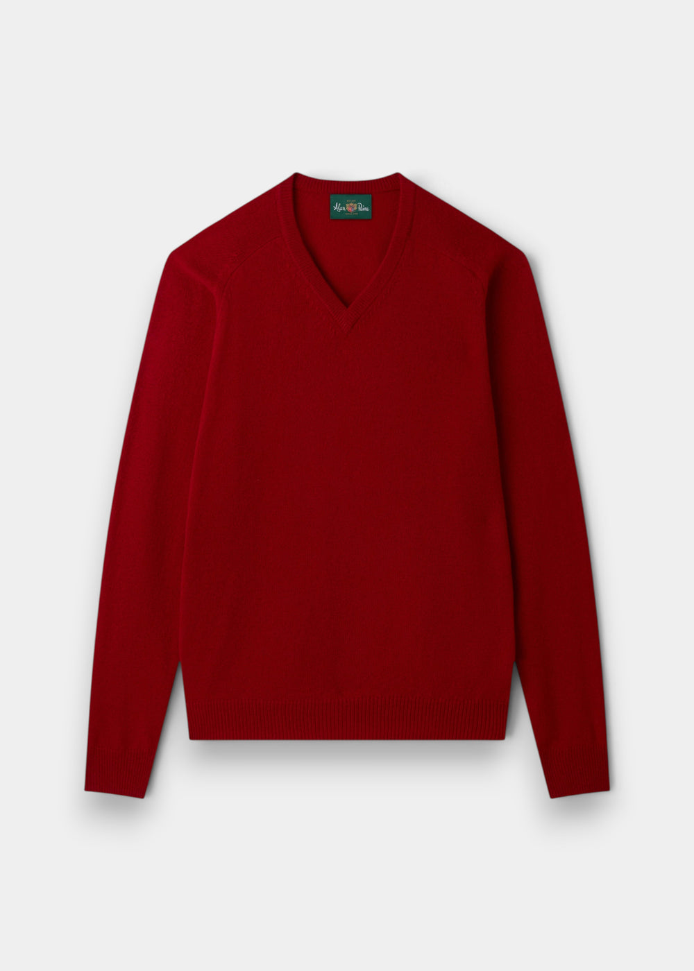 The Kilsyth Lambswool V-Neck Jumper in Dubonnet is shown laid flat on a light gray background.